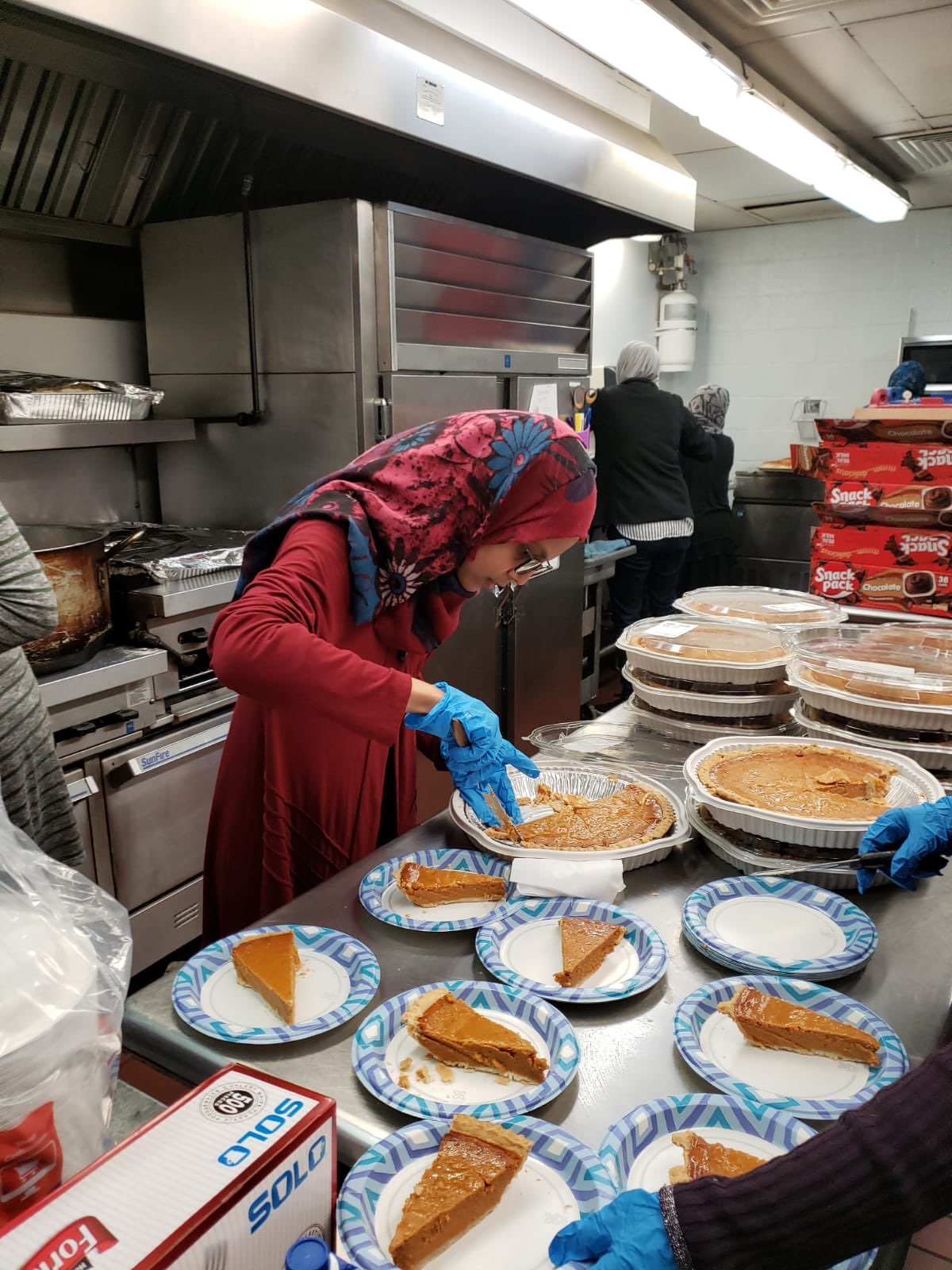 Volunteers preparing hot meals